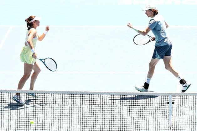 TENNIS AUSTRALIAN OPEN, Kimberly Birrell and John-Patrick Smith of Australia during their mixed doubles final match against Olivia Gadecki and John Peers of Australia during the 2025 Australian Open at Melbourne Park in Melbourne, Friday, January 24, 2025. ( NO ARCHIVING, EDITORIAL USE ONLY, NO USE IN BOOKS WITHOUT CONSENT MELBOURNE VICTORIA AUSTRALIA  Copyright: xJAMESxROSSx 20250124134751283433