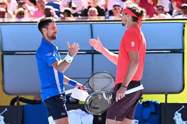 TENNIS AUSTRALIAN OPEN, Novak Djokovic of Serbia shakes hands with Alexander Zverev of Germany after retiring and loosing the first set, during his semi-final match during the 2025 Australian Open at Melbourne Park in Melbourne, Friday, January 24, 2025. ( NO ARCHIVING, EDITORIAL USE ONLY, NO USE IN BOOKS WITHOUT CONSENT MELBOURNE VICTORIA AUSTRALIA  Copyright: xJAMESxROSSx 20250124150424875936