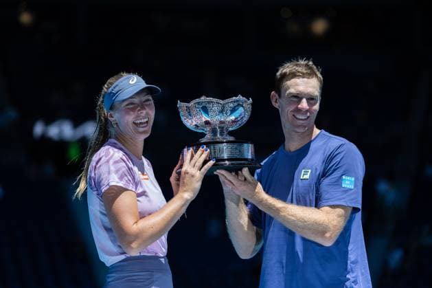 (250124) -- MELBOURNE, Jan. 24, 2025 -- Olivia Gadecki (L) John Peers pose for photos with the trophy after the mixed doubles final between Olivia Gadecki John Peers of Australia and their compatriots Kimberly Birrell John-Patrick Smith at Australian Open tennis tournament in Melbourne, Australia, Jan. 24, 2025. (Photo by Xinhua) (SP)AUSTRALIA-MELBOURNE-TENNIS-AUSTRALIAN OPEN-MIXED DOUBLES-FINALS HuxJingchen 