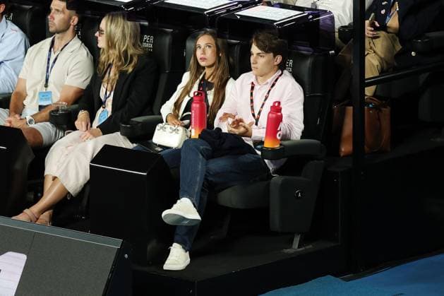 Lily Zneimer and Oscar Piastri watch the Ben Shelton v Jannik Sinner Semi-final match in the Rod Laver Arena Australian Open, Day Thirteen, Tennis, Melbourne Park, Melbourne, Australia - 24 Jan 2025  Copyright: xRachelxBach Shutterstockx 15108800dl
