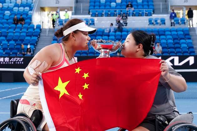 (250124) -- MELBOURNE, Jan. 24, 2025 -- Wang Ziying Li Xiaohui (L) celebrate after winning the women s wheelchair doubles final between Wang Ziying Li Xiaohui of China and Zhu Zhenzhen (China) Tanaka Manami (Japan) at Australian Open tennis tournament in Melbourne, Australia, Jan. 24, 2025. (Photo by Xinhua) (SP)AUSTRALIA-MELBOURNE-TENNIS-AUSTRALIAN OPEN-WOMEN S WHEELCHAIR DOUBLES-FINAL ChuxChen 