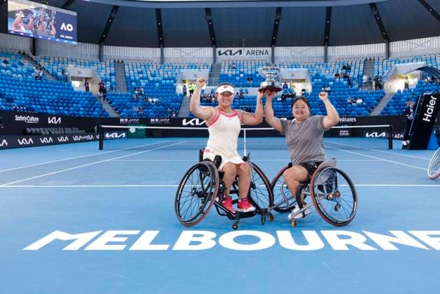 (250124) -- MELBOURNE, Jan. 24, 2025 -- Wang Ziying Li Xiaohui (L) pose with the trophy after winning the women s wheelchair doubles final between Wang Ziying Li Xiaohui of China and Zhu Zhenzhen (China) Tanaka Manami (Japan) at Australian Open tennis tournament in Melbourne, Australia, Jan. 24, 2025. (Photo by Xinhua) (SP)AUSTRALIA-MELBOURNE-TENNIS-AUSTRALIAN OPEN-WOMEN S WHEELCHAIR DOUBLES-FINAL ChuxChen 