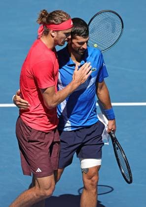 Alexander Zverev, GER, and Novak Djokovic, SRB, after retirement due to injury during semifinals of 2025 Australian Open in Melbourne, 24 01 2025; -