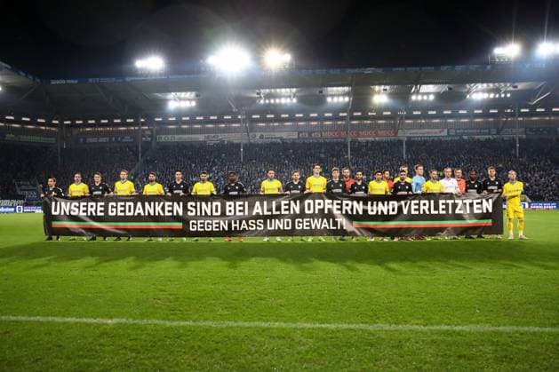 Sport Bilder des Tages 24.01.2025, xgox, Fussball 2. Bundesliga, 1. FC Magdeburg - Eintracht Braunschweig emspor, v.l. Spruchband Banner, Gedenken an den Anschlag auf den Weihnachtsmarkt in Magdeburg am 20.12.2024 (DFL DFB REGULATIONS PROHIBIT ANY USE OF PHOTOGRAPHS as IMAGE SEQUENCES and or QUASI-VIDEO) Magdeburg