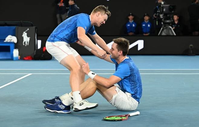 TENNIS AUSTRALIAN OPEN, Harri Heliovaara of Finland (left) reacts with Henry Patten of Great Britain after winning the men s doubles final against Simone Bolelli and Andrea Vavassori of Italy during the 2025 Australian Open at Melbourne Park in Melbourne, Saturday, January 25, 2025. ( NO ARCHIVING, EDITORIAL USE ONLY, NO USE IN BOOKS WITHOUT CONSENT MELBOURNE VICTORIA AUSTRALIA  Copyright: xJAMESxROSSx 20250126124707506220