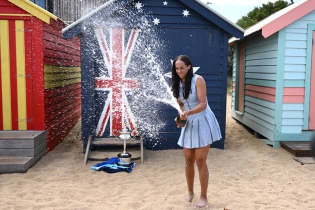 AUSTRALIAN OPEN WOMENS FINAL WINNER, Madison Key of the USA sprays champagne with the with the Daphne Akhurst Memorial Cup at Brighton Life Saving Club in Melbourne, Sunday, January 26, 2025. Madison Keys has claimed her maiden Grand Slam singles title, winning the Australian Open 2025 women?s crown at Melbourne Park. ( NO ARCHIVING, EDITORIAL USE ONLY, NO USE IN BOOKS WITHOUT CONSENT MELBOURNE VICTORIA AUSTRALIA  Copyright: xJOELxCARRETTx 20250126170839953900