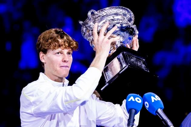 MELBOURNE, VIC - JANUARY 26: Jannik Sinner of italy raises the Norman Brookes Challenge Cup after winning the Men s Singles Final of the 2025 Australian Open on January 26 2025, at Melbourne Park in Melbourne, Australia. (Photo by Jason Heidrich Icon Sportswire) TENNIS: JAN 26 Australian Open EDITORIAL USE ONLY Icon250126004