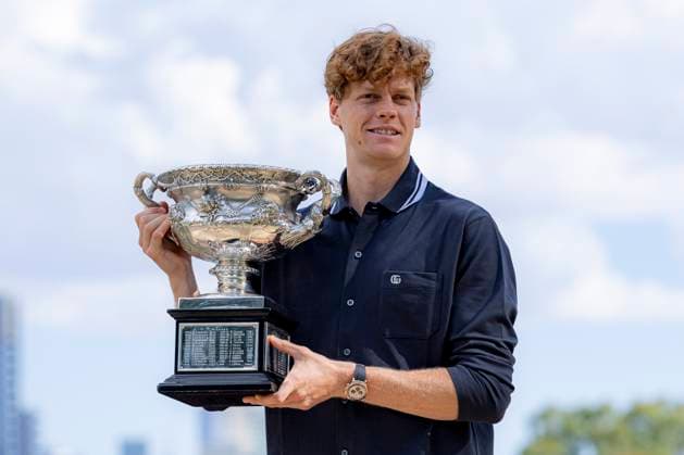 (250127) -- MELBOURNE, Jan. 27, 2025 -- Jannik Sinner of Italy poses with the trophy during the Australian Open winner photo shoot at the Albert Park Lake, in Melbourne, Australia, Jan. 27, 2025. (Photo by Xinhua) (SP)AUSTRALIA-MELBOURNE-TENNIS-AUSTRALIAN OPEN-TROPHY ChuxChen 