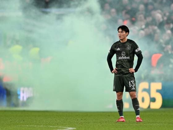 Birmingham, England, 29th January 2025. Celtic™s Yang Hyun-jun looks on with a smoke bomb in the background during the UEFA Champions League match at Villa Park, Birmingham. Picture credit should read: Cody Froggatt Sportimage EDITORIAL USE ONLY. No use with unauthorised audio, video, data, fixture lists, club league logos or live services. Online in-match use limited to 120 images, no video emulation. No use in betting, games or single club league player publications. SPI_048_CF_Aston_Villa_Celtic SPI-3641-0048