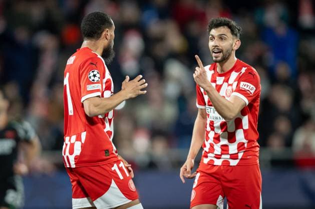 Arnaut Danjuma (Girona FC) and Ivan Martin (Girona FC) in action during a UEFA Champions League match between Girona FC and Arsenal FC at Estadi Municipal de Montilivi in Girona, Girona, Spain, on January 29 2025. Photo by Felipe Mondino Copyright: x@FELIPExMONDINOx