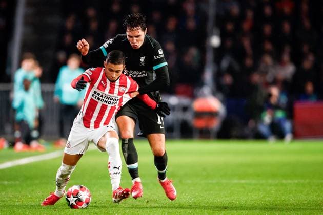 2025-01-29 PSV Eindhoven v Liverpool FC - UEFA Champions League 2024 25 League Phase MD8 EINDHOVEN, NETHERLANDS - JANUARY 29: Mauro Junior of PSV battles for possession with Federico Chiesa of Liverpool FC during the UEFA Champions League 2024 25 League Phase MD8 match between PSV Eindhoven and Liverpool FC at PSV Stadion on January 29, 2025 in Eindhoven, Netherlands. Eindhoven PSV Stadion Netherlands Content not available for redistribution in The Netherlands directly or indirectly through any third parties. Copyright: xBroerxvanxdenxBoomx