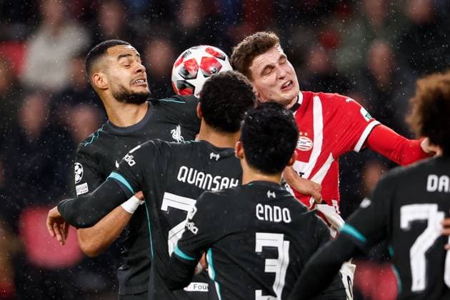 2025-01-29 PSV Eindhoven v Liverpool FC - UEFA Champions League 2024 25 League Phase MD8 EINDHOVEN, NETHERLANDS - JANUARY 29: Cody Gakpo of Liverpool FC heads the ball with Guus Til of PSV during the UEFA Champions League 2024 25 League Phase MD8 match between PSV Eindhoven and Liverpool FC at PSV Stadion on January 29, 2025 in Eindhoven, Netherlands. Eindhoven PSV Stadion Netherlands Content not available for redistribution in The Netherlands directly or indirectly through any third parties. Copyright: xBroerxvanxdenxBoomx