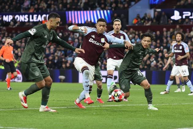 Aston Villa v Celtic FC 29 January 2025, Aston - UEFA Champions League Football - Aston Villa v Celtic - Ezri Konsa of Aston Villa is kept at bay by Reo Hatate of Celtic - Photo: Charlotte Wilson Offside. Aston UK Copyright: xCharlottexWilsonx xOffsidexOffside
