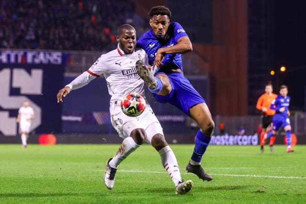 GNK Dinamo v AC Milan - UEFA Champions League 2024 25 League Phase MD8 Ronael Pierre-Gabriel of Dinamo Zagreb and Yunus Musah of AC Milan fights for the ball during the UEFA Champions League 2024 25 League Phase MD8 match between GNK Dinamo and AC Milan at Maksimir Stadium on January 29, 2025. in Zagreb, Croatia.  LukaxStanzl PIXSELL