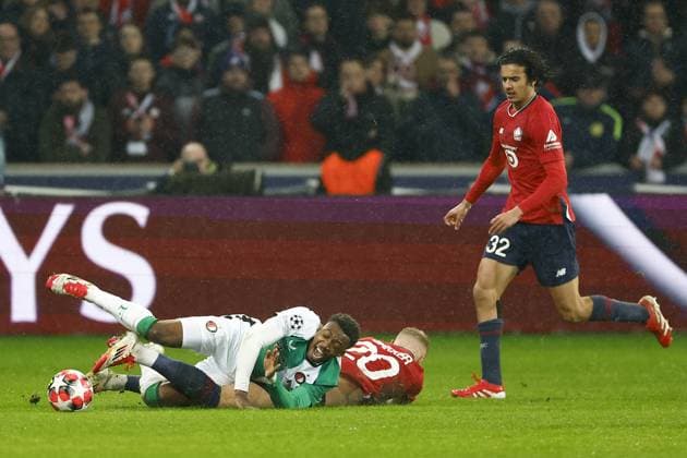 LILLE, 29-01-2025. Decathlon Arena Stade Pierre Mauroy. Football, UEFA Champions League season 2024 2025. Lille - Feyenoord. (L-R) Feyenoord player Antoni Milambo, Lille player Mitchel Bakker during the match Borussia LOSC Lille - Feyenoord Lille - Feyenoord  x27614369x Copyright: