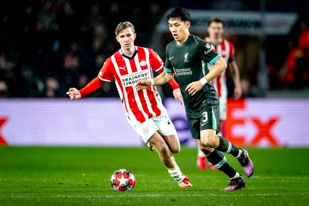 PSV Eindhoven midfielder Tygo Land, Liverpool FC defender Wataru Endo during the match PSV - Liverpool at the Philips stadium for the Champions League - League phase - Matchday 8 season 2024-2025 in EINDHOVEN, Netherlands on 29 january 2025, (photo by Marcel van Dorst EYE4images DeFodi Images) Defodi-746_211684