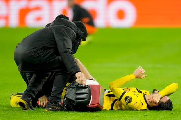Ramy Bensebaini (Borussia Dortmund) on the ground during the UEFA Champions League 2024 25 League Phase MD8 match between Borussia Dortmund and FC Shakhtar Donetsk at Signal Iduna Park on January 29, 2025 in Dortmund, Germany. (Photo by Alex Gottschalk DeFodi Images) Defodi-001_20250129__1320740
