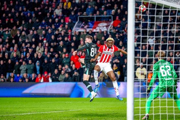 EINDHOVEN, 29-01-2025, Philips Stadium, UEFA Champions League season 2024 25, match between PSV and Liverpool, Liverpool FC player Conor Bradley and PSV player Adamo Nagalo PSV - Liverpool  x27615128x Copyright: