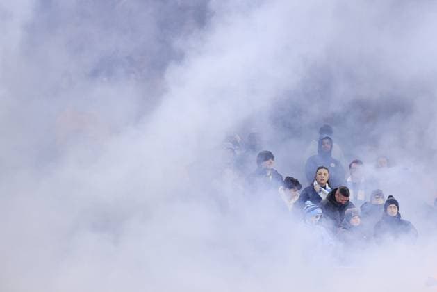 Football - UEFA Champions League - League Phase - Manchester City v Club Brugge 29th January 2025 - UEFA Champions League - League Phase - Manchester City v Club Brugge - Manchester City fans are engulfed by smoke before the match - Photo: Simon Stacpoole Offside. Manchester UK Copyright: xSimonxStacpoolexOffside