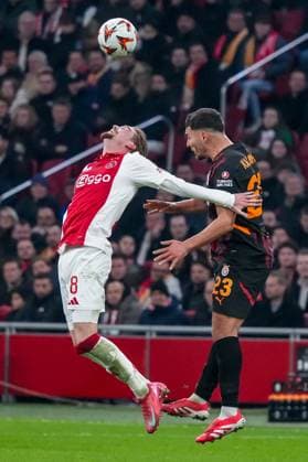 2025-01-30 AFC Ajax v Galatasaray - UEFA Europa League 2024 25 League Phase MD8 AMSTERDAM, NETHERLANDS - JANUARY 30: Kenneth Taylor of AFC Ajax battles for the ball with Kaan Ayhan of Galatasaray during the UEFA Europa League 2024 25 League Phase MD8 match between AFC Ajax and Galatasaray at Johan Cruijff ArenA on January 30, 2025 in Amsterdam, Netherlands. Amsterdam Johan Cruijff ArenA Netherlands Content not available for redistribution in The Netherlands directly or indirectly through any third parties. Copyright: xGabrielxCalvinoxAlonsox