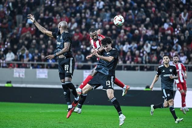 9 Ayoub El Kaabi of Olympiacos FC competing with 13 Bahlul Mustafazade of Qarabag during the Europa League, Matchday 8 match between Olympiacos FC and Qarabag at Georgios Karaiskakis Stadium in Piraeus, Greece, on January 30, 2025.  Copyright: xStefanosxKyriazis IPAxSportx xipa-agency.netx xx IPA_53474047 IPA_Agency_IPA53474047