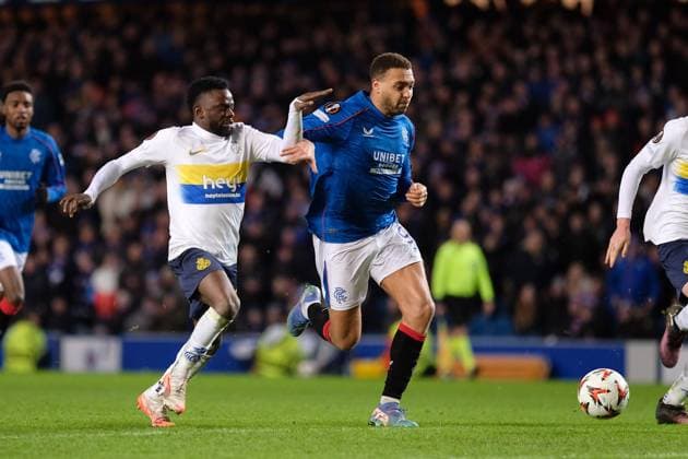 UK: Rangers v Union Saint-Gilloise, UEFA Europa League at Ibrox Stadium, Glasgow, Scotland on 30 January 2025: Pictured: Ousseynou Niang (Union SG) and Cyriel Dessers (Rangers) Glasgow Ibrox Stadium Scotland Copyright: xAlexxToddx