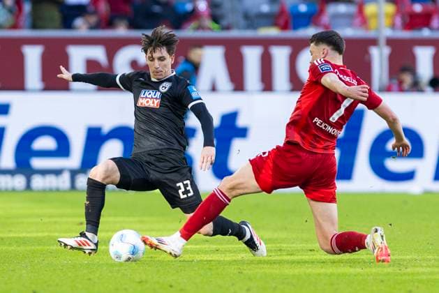 2. Fussball-Bundesliga: Fortuna Düsseldorf - SSV Ulm 1846 Fussball, 01.02.2024 Max Brandt (SSV Ulm 1846 Fussball, 23) im Zweikampf mit Dzenan Pejcinovic (Fortuna Düsseldorf, 7). 2. Fussball-Bundesliga, Fortuna Düsseldorf - SSV Ulm 1846 Fussball, 20. Spieltag, am 01.02.2024, Merkur Spiel-Arena, Düsseldorf DFL regulations prohibit any use of photographs as image sequences and or quasi-video