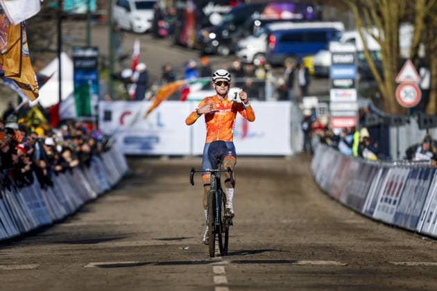 LIEVIN, FRANCE - Tibor Del Grosso (Netherlands) crosses the finish line first during the cyclocross World Cup in Lievin, France. ANP BAS CZERWINSKI xVIxANPxSportx xxANPxIVx 518847318 originalFilename: 518847318.jpg