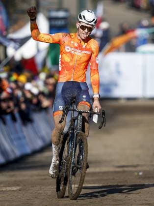 LIEVIN, FRANCE - Tibor Del Grosso (Netherlands) crosses the finish line first during the cyclocross World Cup in Lievin, France. ANP BAS CZERWINSKI xVIxANPxSportx xxANPxIVx 518847396 originalFilename: 518847396.jpg
