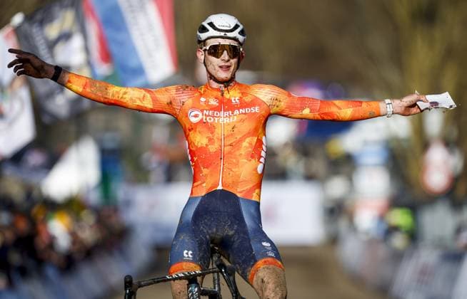 LIEVIN, FRANCE - Tibor Del Grosso (Netherlands) crosses the finish line first during the cyclocross World Cup in Lievin, France. ANP BAS CZERWINSKI xVIxANPxSportx xxANPxIVx 518847469 originalFilename: 518847469.jpg