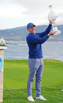 PEBBLE BEACH, CA - FEBRUARY 02: PGA, Golf Herren golfer Rory McIlroy holds the trophy up after winning the AT&T Pebble Beach Pro AM on February 2, 2025, at Pebble Beach Golf Links in Pebble Beach, California. (Photo by Brian Spurlock Icon Sportswire) GOLF: FEB 02 PGA AT&T Pebble Beach Pro-Am EDITORIAL USE ONLY Icon25020267