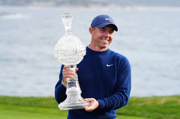 PEBBLE BEACH, CA - FEBRUARY 02: PGA, Golf Herren golfer Rory McIlroy poses with the trophy after winning the AT&T Pebble Beach Pro AM on February 2, 2025, at Pebble Beach Golf Links in Pebble Beach, California. (Photo by Brian Spurlock Icon Sportswire) GOLF: FEB 02 PGA AT&T Pebble Beach Pro-Am EDITORIAL USE ONLY Icon25020270