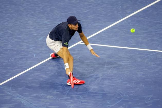 FRISCO, TX - FEBRUARY 03: Matteo Arnaldi (ITA) stretches for a forehand during the first round of the Dallas Open on February 3, 2025, at Ford Center at The Star in Frisco, TX. (Photo by George Walker Icon Sportswire) TENNIS: FEB 03 Dallas Open EDITORIAL USE ONLY Icon250203031