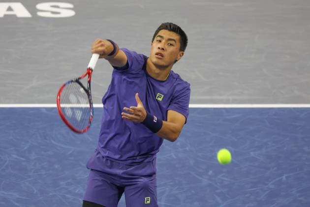 FRISCO, TX - FEBRUARY 05: Brandon Nakashima (USA) hits an overhead during the first round of the Dallas Open on February 5, 2025, at Ford Center at The Star in Frisco, TX. (Photo by George Walker Icon Sportswire) TENNIS: FEB 05 Dallas Open EDITORIAL USE ONLY Icon25020506