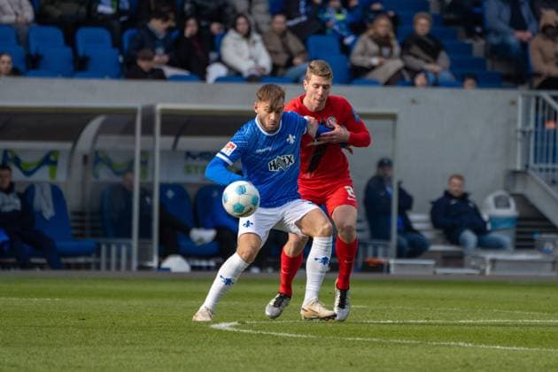 08.02.2025, xhfmx, Fussball 2.Bundesliga, SV Darmstadt 98 - SV Elversberg Kilian Corredor (SV Darmstadt 98), Elias Baum (SV 07 Elversberg) im Zweikampf (DFL DFB REGULATIONS PROHIBIT ANY USE OF PHOTOGRAPHS as IMAGE SEQUENCES and or QUASI-VIDEO) Darmstadt