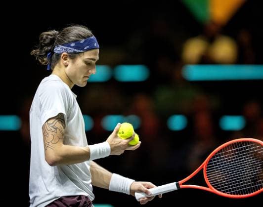 ROTTERDAM - Mattia Bellucci (ITA) in action against Alex de Minaur (AUS) on the sixth day of the ABN AMRO Open tennis tournament in Ahoy. ANP SANDER KING ABN AMRO Open - Day Six 2025 xVIxANPxSportx xxANPxIVx 519420826 originalFilename: 519420826.jpg