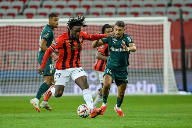 FOOTBALL : OGC Nice vs RC Lens - ligue 1 - 8 02 25 Nice™s forward 29 Evann Guessand and RC Lens s 14 Facundo Medina fight for the ball during the French L1 football match between Nice (OGC Nice) and Lens (RC Lens) at Allianz Riviera Stadium of Nice, south France, on February 8, 2025. NICEFrance  Copyright: xfredxDIDES psnewzx