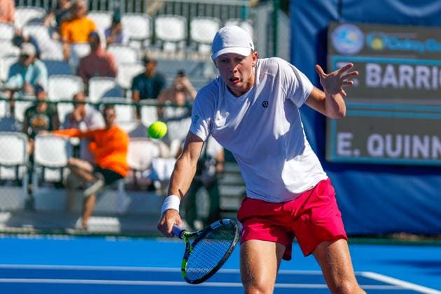 DELRAY BEACH, FL - FEBRUARY 08: Ethan Quinn (USA) hits a backhand shot at the Delray Beach Open on February 8, 2025, at the Delray Beach Stadium & Tennis Center in Delray Beach, Florida.(Photo by Chris Arjoon Icon Sportswire) TENNIS: FEB 08 Delray Beach Open EDITORIAL USE ONLY Icon25020800119