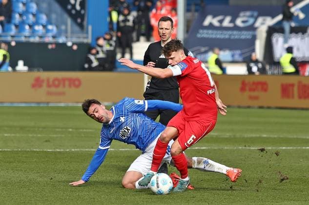 08.02.2025, xpfrx, Fussball 2.Bundesliga, SV Darmstadt 98 - SV Elversberg v.l. Philipp Förster (Darmstadt), Robin Fellhauer (Elversberg) (DFL DFB REGULATIONS PROHIBIT ANY USE OF PHOTOGRAPHS as IMAGE SEQUENCES and or QUASI-VIDEO) Darmstadt
