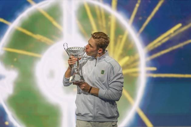 FRISCO, TX - FEBRUARY 09: Denis Shapovalov (CAN) kisses the trophy after winning the Dallas Open on February 9, 2025 at Ford Center at The Star in Frisco, TX. (Photo by George Walker Icon Sportswire) TENNIS: FEB 09 Dallas Open EDITORIAL USE ONLY Icon250209001