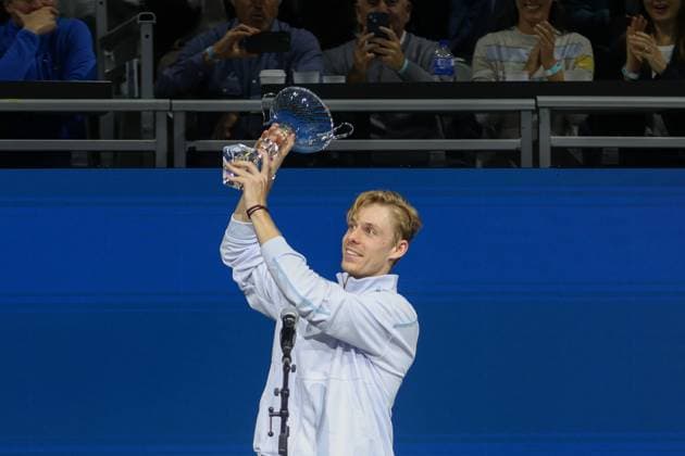 FRISCO, TX - FEBRUARY 09: Denis Shapovalov (CAN) raises the trophy after winning the Dallas Open on February 9, 2025 at Ford Center at The Star in Frisco, TX. (Photo by George Walker Icon Sportswire) TENNIS: FEB 09 Dallas Open EDITORIAL USE ONLY Icon250209002