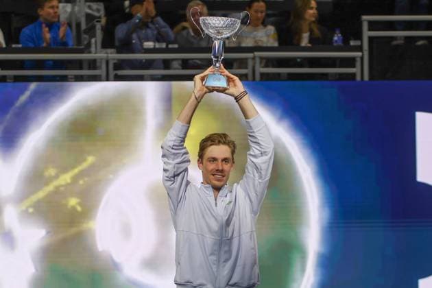 FRISCO, TX - FEBRUARY 09: Denis Shapovalov (CAN) raises the trophy after winning the Dallas Open on February 9, 2025 at Ford Center at The Star in Frisco, TX. (Photo by George Walker Icon Sportswire) TENNIS: FEB 09 Dallas Open EDITORIAL USE ONLY Icon250209007