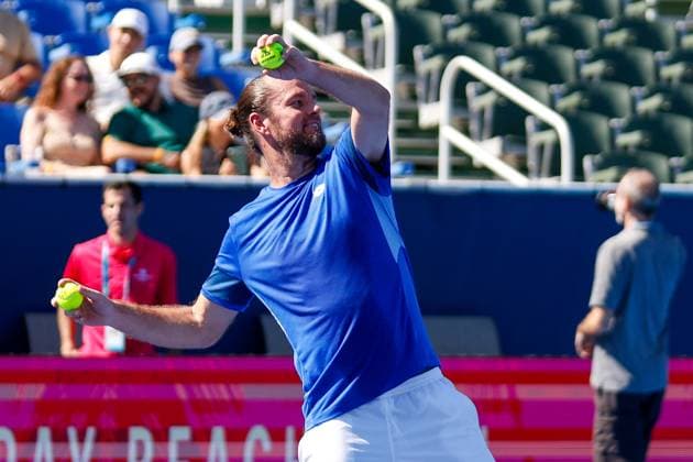 DELRAY BEACH, FL - FEBRUARY 09: Xavier Malisse (BEL) throws signed balls into the crowd after the Legends Event match against Murphy Jensen (USA) and Ryan Harrison (USA) at the Delray Beach Open on Sunday February 9, 2025, at the Delray Beach Stadium & Tennis Center in Delray Beach, Florida.(Photo by Chris Arjoon Icon Sportswire) TENNIS: FEB 09 Delray Beach Open EDITORIAL USE ONLY Icon250209001119