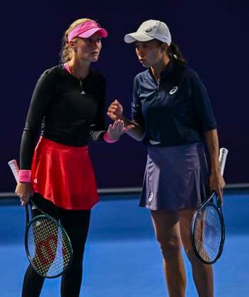 (250211) -- DOHA, Feb. 11, 2025 -- Kristina Mladenovic (L) Zhang Shuai react during the women s doubles round of 32 match between Kristina Mladenovic (France) zhang Shuai (China) and Alexandra Panova Fanny Stollar of Hungary at the WTA, Tennis Damen Qatar Open tennis tournament in Doha, Qatar, on Feb. 10, 2025. (Photo by Xinhua) (SP)QATAR-DOHA-TENNIS-WTA-QATAR OPEN Nikku 