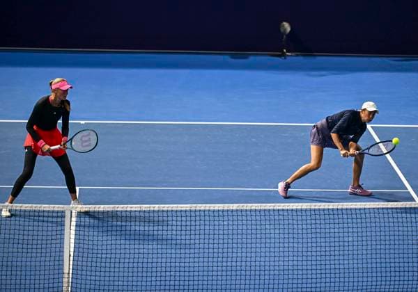 (250211) -- DOHA, Feb. 11, 2025 -- Kristina Mladenovic (L) Zhang Shuai compete during the women s doubles round of 32 match between Kristina Mladenovic (France) zhang Shuai (China) and Alexandra Panova Fanny Stollar of Hungary at the WTA, Tennis Damen Qatar Open tennis tournament in Doha, Qatar, on Feb. 10, 2025. (Photo by Xinhua) (SP)QATAR-DOHA-TENNIS-WTA-QATAR OPEN Nikku 