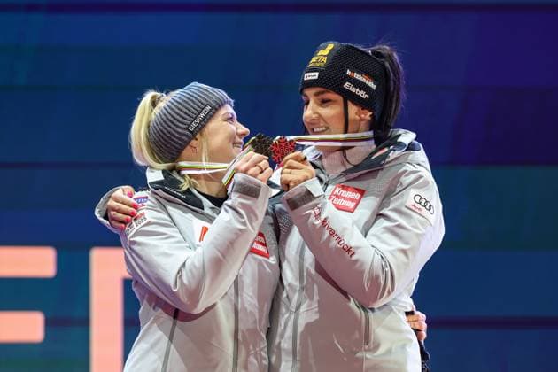 ALPINE SKIING - FIS Ski WC Saalbach 2025 SAALBACH,AUSTRIA,11.FEB.25 - ALPINE SKIING - FIS Alpine World Ski Championships Saalbach 2025, team combined, ladies, medal plaza, award ceremony. Image shows Katharina Truppe and Stephanie Venier (AUT). Keywords: medal.  GEPAxpictures xHaraldxSteiner