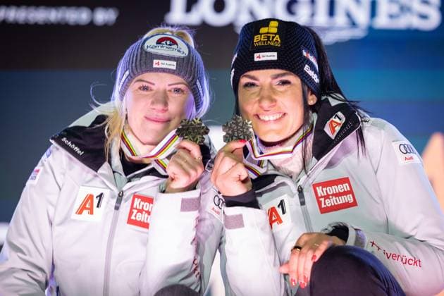 ALPINE SKIING - FIS Ski WC Saalbach 2025 SAALBACH,AUSTRIA,11.FEB.25 - ALPINE SKIING - FIS Alpine World Ski Championships Saalbach 2025, team combined, ladies, medal plaza, award ceremony. Image shows Katharina Truppe and Stephanie Venier (AUT). Keywords: medals.  GEPAxpictures xHaraldxSteiner