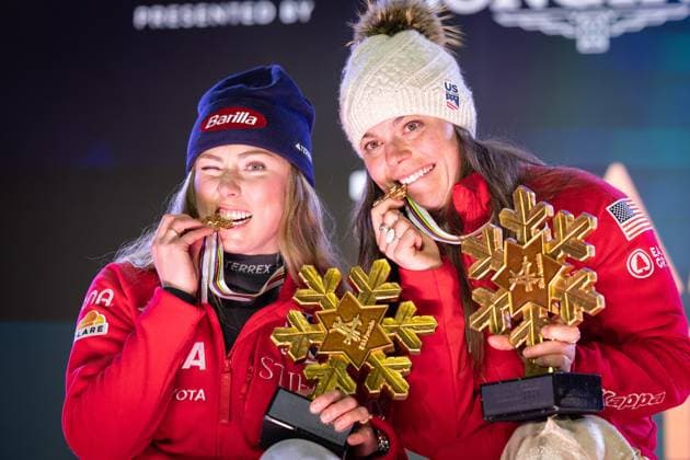ALPINE SKIING - FIS Ski WC Saalbach 2025 SAALBACH,AUSTRIA,11.FEB.25 - ALPINE SKIING - FIS Alpine World Ski Championships Saalbach 2025, team combined, ladies, medal plaza, award ceremony. Image shows Mikaela Shiffrin and Breezy Johnson (USA). Keywords: medals and trophies.  GEPAxpictures xHaraldxSteiner
