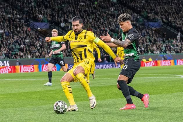 11.02.2025, Fussball: UEFA Champions League, Saison 2024 2025, Play Offs, Hinspiel, Sporting CP Lissabon - Borussia Dortmuna im Estadio Jose Alvalade in Lissabon. Dortmunds Emre Can (l) und Lissabons Maxi Araujo kämpfen um den Ball. Foto: Kirchner-Media Thomas Haesler WICHTIGER HINWEIS: Gemäß den Vorgaben der UEFA ist es untersagt, in dem Stadion und oder vom Spiel angefertigte Fotoaufnahmen in Form von Sequenzbildern und oder videoähnlichen Fotostrecken zu verwerten bzw. verwerten zu lassen. Copyright: xKirchner-Media ThomasxHaeslerx