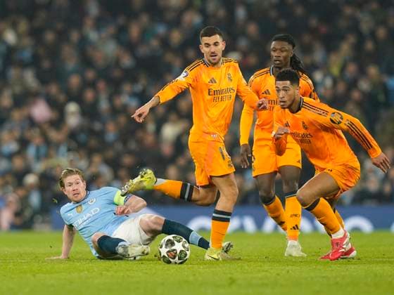 Manchester, England, 11th February 2025. Manchester City™s Kevin De Bruyne with Real Madrid™s Eduardo Camavinga during the UEFA Champions League match at the Etihad Stadium, Manchester. Picture credit should read: Andrew Yates Sportimage EDITORIAL USE ONLY. No use with unauthorised audio, video, data, fixture lists, club league logos or live services. Online in-match use limited to 120 images, no video emulation. No use in betting, games or single club league player publications. SPI_AY_028_Man_City_Real_Madrid SPI-3675-0063